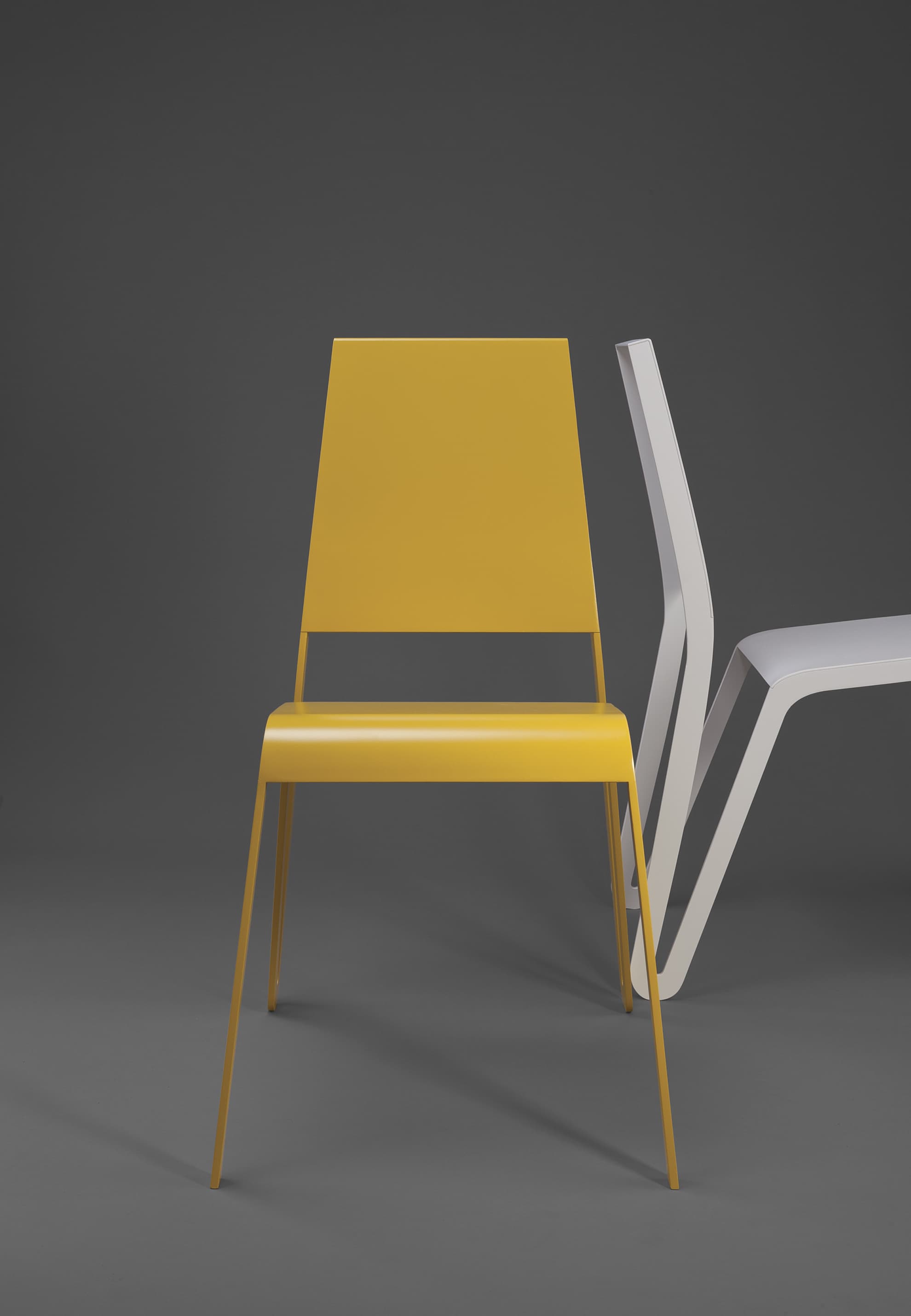 Photo of Kind of Design chairs, in yellow and white